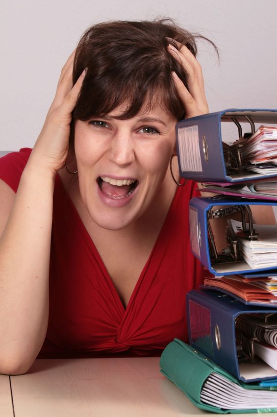 This young woman's work is piling up
